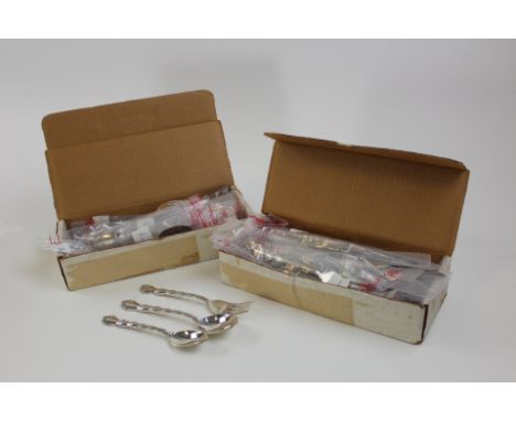 Reed & Barton Sterling silver flatware set in the "Tara" Pattern. A 48 piece set still in its original packaging with a total