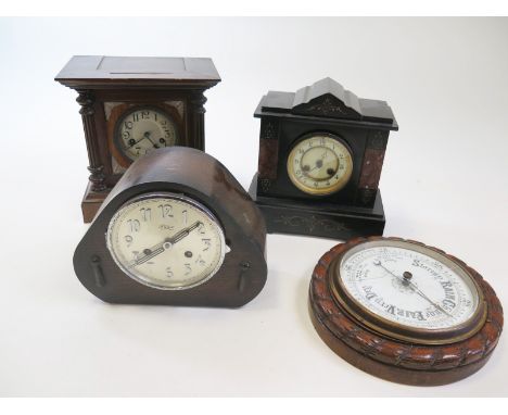 Three clocks and an oak barometer including a slate clock, a wooden bracked clock and a napoleans hat. 