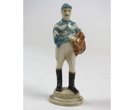 A Poole figure of a standing Gordon Richards, the base with impressed Poole mark approx 15cm high