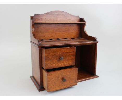 Edwardian Oak smokers cabinet with two drawers and a pipe rack above