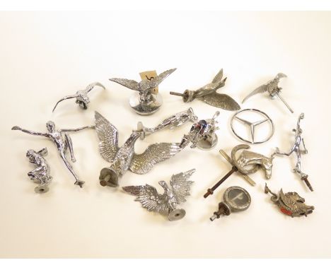 Collection of vintage chrome plated car mascots including figural, racehorse, animal and bird 