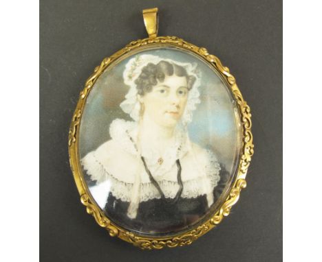 Mourning Portrait of a lady circa 1860 finely painted and depicted in a lace shawl. Mounted in a brass frame.