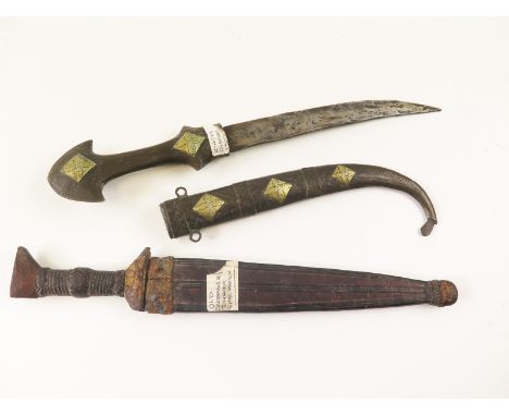 Daggers, both with their scabbards, an early Kinjal, with a Sudanese dagger  (2)  a/f