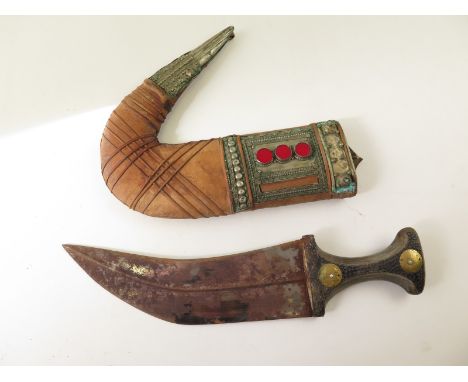 Arabian styled old Jambiya dagger, with bone/horn handle, leather scabbard and silver decoration with gold ? coins to handle