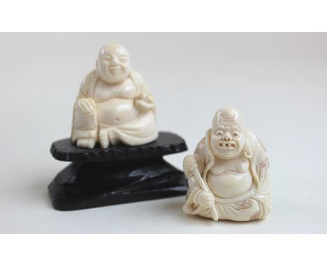 Two 19th century Japanese Ivory carvings of Buddha the first as a signed netsuke and the other mounted on a plinth 