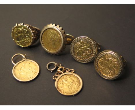 Sovereign ring along with three Half Sovereign rings & two Half Sovereign ear rings , all in 9ct gold mounts. total weight ap