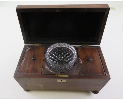 Victorian ladies vanity box in rosewood with a MOP cartouche with an earlier rosewood sarcophagus shaped tea caddy complete w