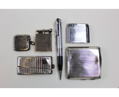 Smoking interest. Silver Cigarette case Hallmarked Birmingham 1931, silver Vesta Hallmarked Birmingham 1905, Silver match hol
