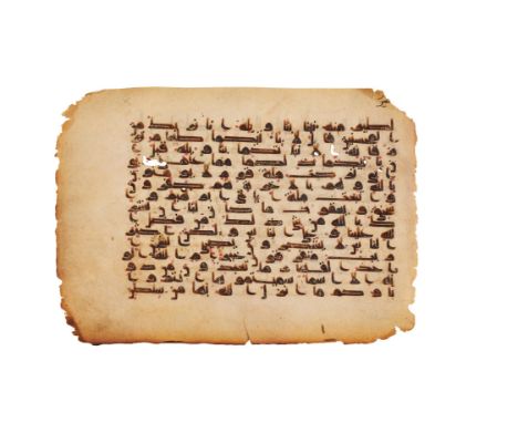 Leaf from a fine Kufic Qur'an, in Arabic, decorated manuscript on parchment [Abbasid territories (possibly Syria), ninth cent