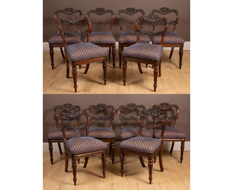 Made from Gonçalo Alves timber following a design in the Gillows book. The chairs with a foliate carved top rail and splat, a