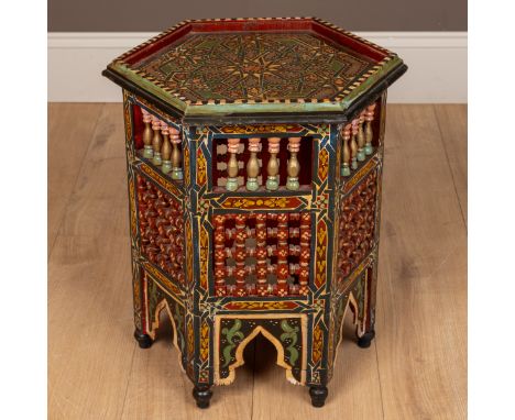 With geometric bobbin turned panels to the sides and arcade ornament, on turned feet.38cm wide x 50cm highQty: 1In good condi