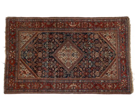 To include an early 20th century hand-woven Hamadan with a blue ground, central bar medallion, and a guarded border, 220cm x 