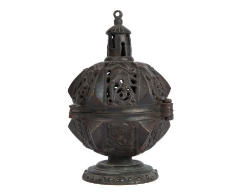 Of spherical form surmounted by a small tower with keyhole windows. The body of the censer with stylised Celtic animal design
