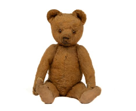 With articulated limbs and head, and possibly originally with a growler.31cm highQty: 1This bear was given to the previous ow