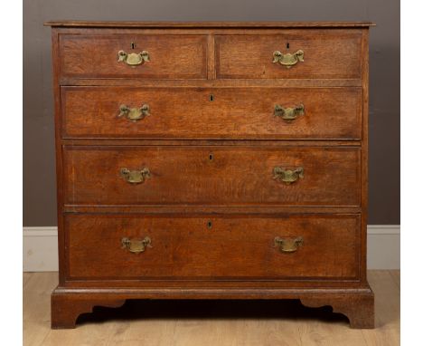The chest with mahogany crossbanded decoration to the top and fronts of the two short and three long drawers, with brass drop