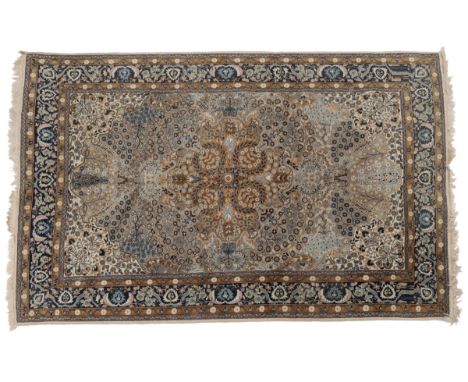 With a grey ground and tan central medallion.221cm x 143cmQty: 1In generally good condition with some light fraying to the ta