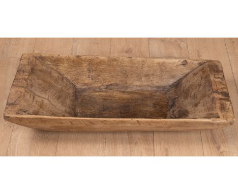 The trug of rectangular form and with a handle to one end.87cm wide x 36cm deep x 18cm highQty: 1In generally good condition.