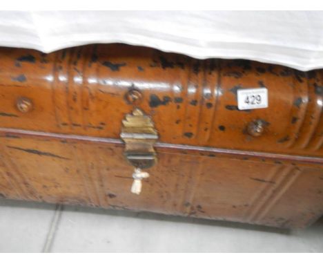A tin trunk