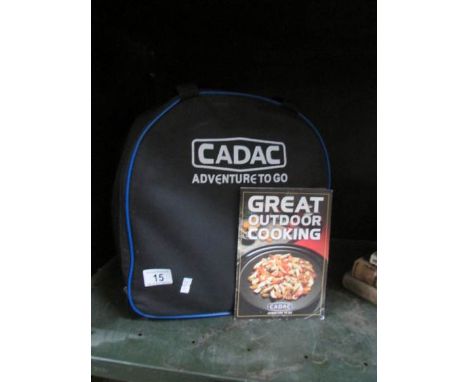 A cased Cadal safari shelf cooker