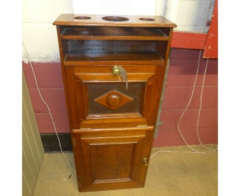 SOLD IN TIMED AUCTION
A ships wash stand with hinged basin top over panel door H126 x W54 x D20