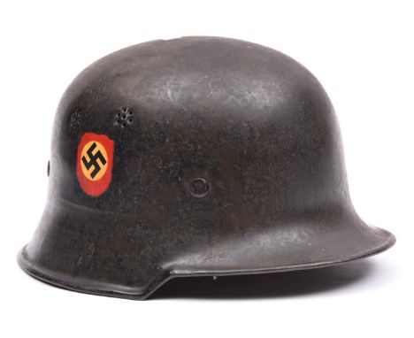 A Third Reich Police double-decal steel combat helmet, with Police and Party decals, original lining with top pad, and leathe