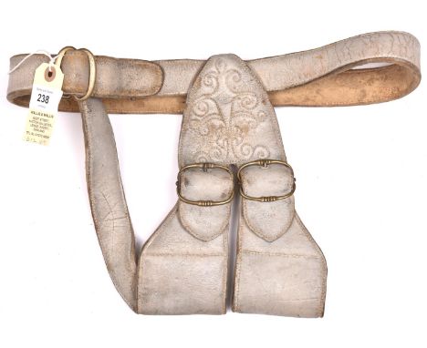 A padded light grey polished leather baldrick, or shoulder harness, for a sword, with stitched scroll panel to twin loops for