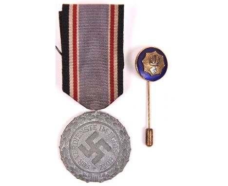 Third Reich grey metal Luftschutz Service medal, with ribbon; and RLB enamelled stick pin. GC