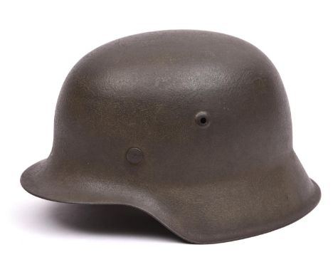 A German M42 single decal Waffen-SS steel helmet, with maker's code and serial number to rear edge(hko 3308?), the skull with