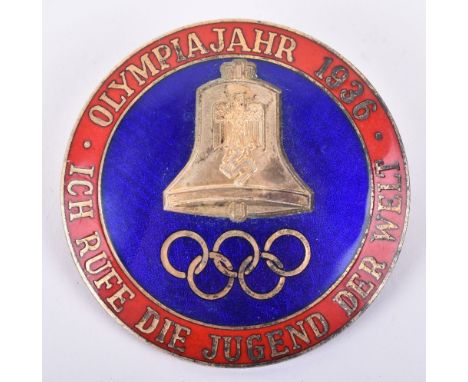 1936 Olympics Commemorative Badge, brass and enamel example with Olympic bell and Olympic rings to the centre. Badge with pin