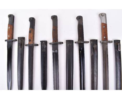 Grouping of Bayonets: Czechoslovakia Mauser bayonets complete with scabbards ,Yugoslavia Mauser bayonets and scabbards and  B