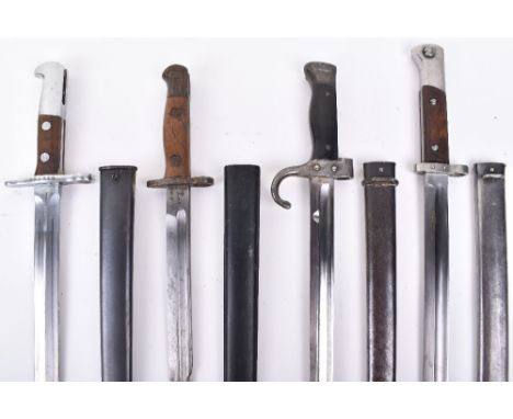 Grouping of Bayonets: Swiss 1918 bayonet complete with scabbard, French 1892 bayonet complete with scabbard, cut down 1907 ba