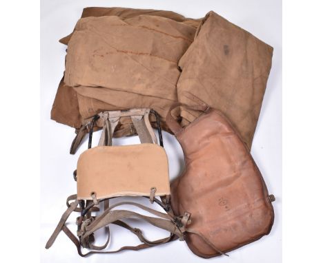 Grouping of Military Equipment, WW2 bed outer stamped with arrow dated 1944; military tent; rucksack frame and leather pad st