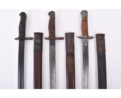 1907 Bayonet and US Remington Bayonets: 1907 bayonet maker stamped CHAPMAN complete with early teardrop scabbard and two US b