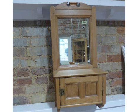 A pine hanging mirror back wall cabinet with a paneled door - Height 74cm 