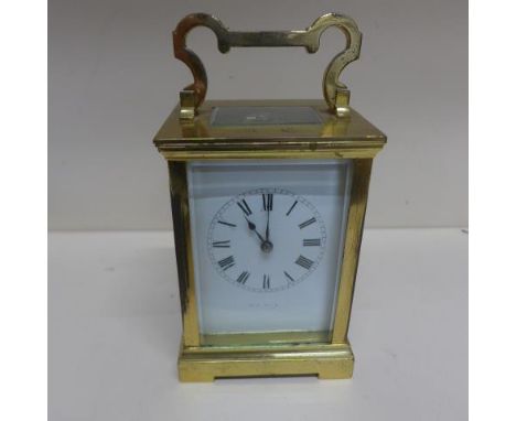 A French carriage clock - Height 14cm with handle down - running, with key 