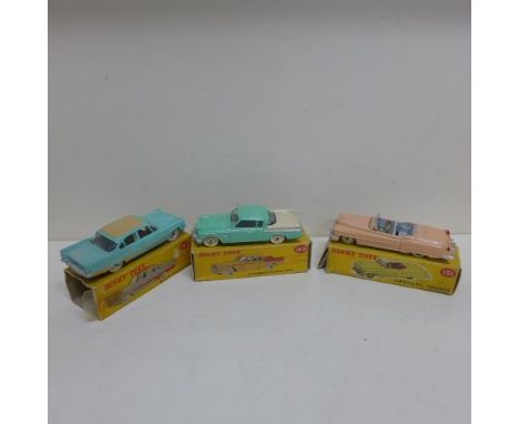 Dinky Toys - Three boxed American cars De Soto Fireflite Sedan 192, Studebaker Golden Hawk 169 and Cadillac Tourer 131, some 