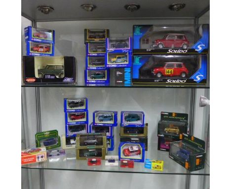 A collection of 35 boxed Solido Prestige, Corgi, Herpa and Cameo mini cars - all boxed and good 