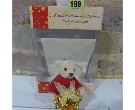 A Steiff bear with a bells wreath - as new - RRP £65 