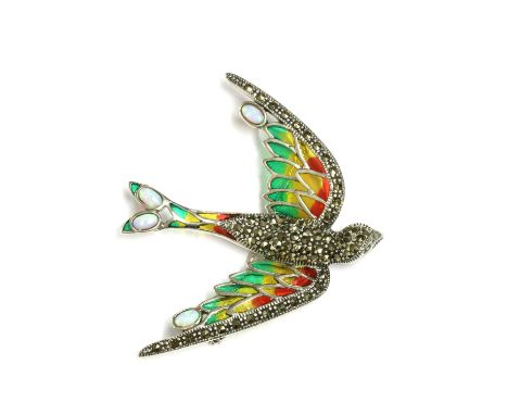 A silver plique-à-jour enamel swallow brooch/pendant, with green, yellow and red plique-à-jour enamel wings, marcasite set bo