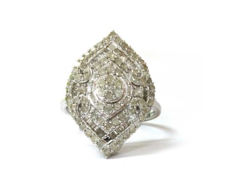 A 9ct white gold diamond cluster ring, the ogee shaped head micro claw and channel set with baguette cut and eight cut diamon