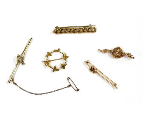 A quantity of Victorian and later brooches, to include a gold three stone diamond bar brooch, with old European and Swiss cut