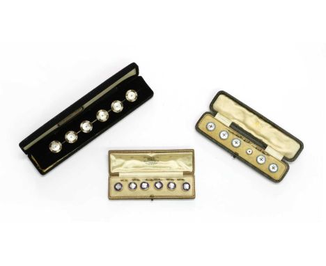 Three sets of buttons, to include a cased set of silver mother-of-pearl and enamel buttons, one deficient, a set of metal spl