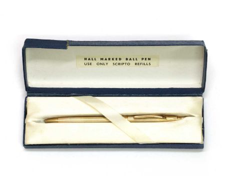 A 9ct gold ballpoint pen, with engine turned decoration and engraved initials, Birmingham 1962, 15.60gCondition report: No in