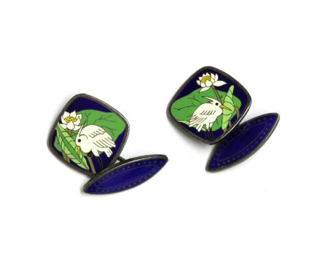 A pair of Japanese silver enamel cufflinks, a cushion shaped enamelled with a heron and water plants, to blue enamelled navet