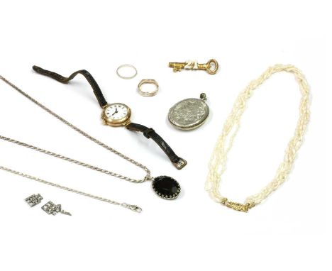 A 9ct gold pin set mechanical strap watch, with a white enamel dial and Roman numerals, import hallmark Glasgow 1911, togethe