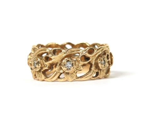 A 14ct gold diamond set 'The Welsh Gold Full Eternity Ring', designed by Stuart Devlin, with brilliant cut diamonds claw set 