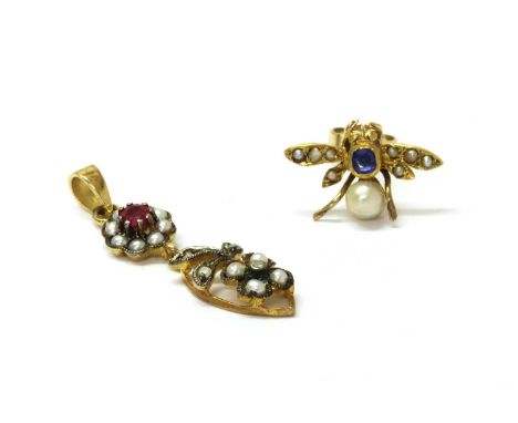 A single gold sapphire and split pearl fly earring, rub set with a cushion mixed cut sapphire and grain set with split pearls