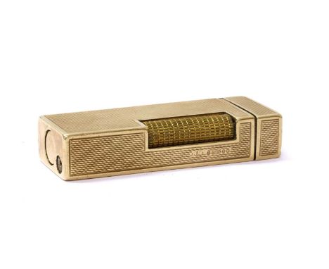 A 9ct gold gas lighter, with engine turned decoration, marked U.S.A. PAT. No. 1657352, London 1961, 6.5cm long, 87.94gConditi