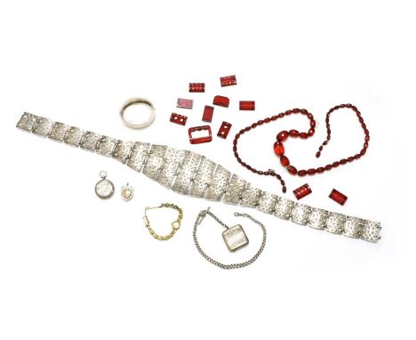 A sterling silver graduated curb link Albert chain, with swivel clasp and 'T' bar, suspending a sterling silver vesta case, t