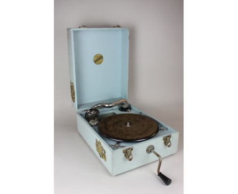 A Lamy Princess gramophone record player in blue case with nursery character stickers, 38cm